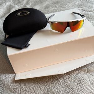Oakley White Frame Sunglasses with Red Lenses
